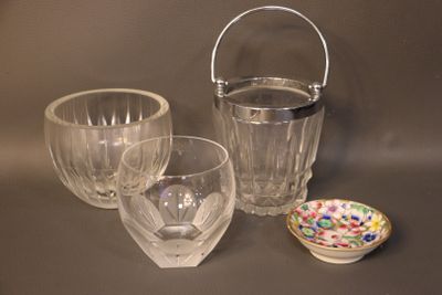 three glasses and a bowl sitting on a table