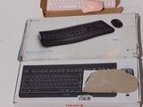 a box with a keyboard and a mouse on top of it