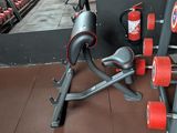 a gym equipment sitting on the floor in a gym