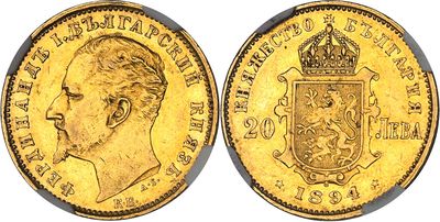 a gold sovereign coin with a crown on top of it