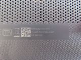 an image of a close up of a metal plate with a qr code on it