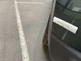 a sticker on the side of a car that says out of town