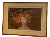 painting of a woman with flowers in her hair in a gold frame