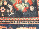 a close up of a rug with a picture on it