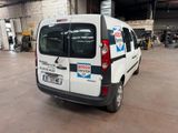 a white van that is parked in a garage