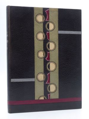 une image représentant un livre noir et rouge orné de cercles