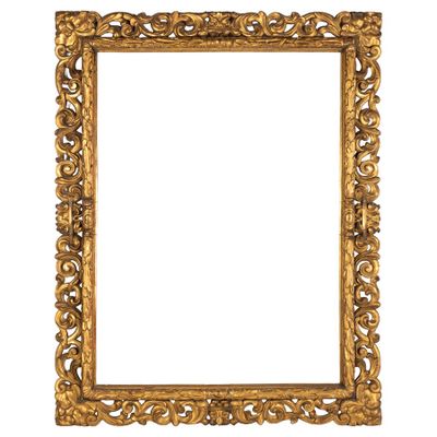 un cadre en vieil or orné d'un motif décoratif sur fond blanc