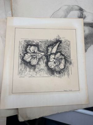 un dessin représentant deux papillons sur une feuille de papier