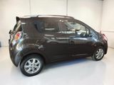 a small car that is parked in a garage