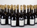 six bottles of wine are lined up in a row