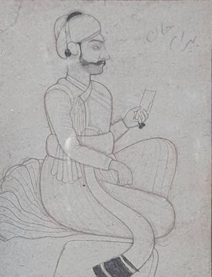 un vieux dessin représentant un homme assis sur un rocher, un téléphone portable à la main