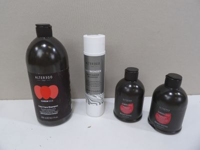 three bottles of shampooe and two bottles of shampooe on the counter