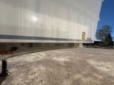 an image of a semi trailer parked in a parking lot