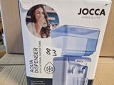 the box of a water purifier is sitting on a cardboard box