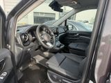 the interior of a car with a steering wheel and dashboard controls