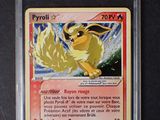 gros plan d'une carte pokemon sur une table