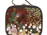 une image représentant un sac à main orné de fleurs