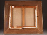 an old picture of a picture frame with a picture in it