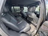the interior of a car with two rows of seats in it