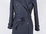an image of a blue trench coat on a mannequin mannequin