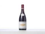 a close up of a bottle of wine on a table