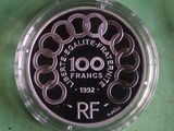 an image of a coin that is on a green surface