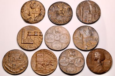 six different types of coins are shown on a white surface
