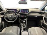 the interior of a car with a dash board and a steering wheel