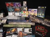a lot of games and dvds on the table