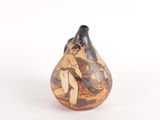 a vase with a picture of a man and a woman on it