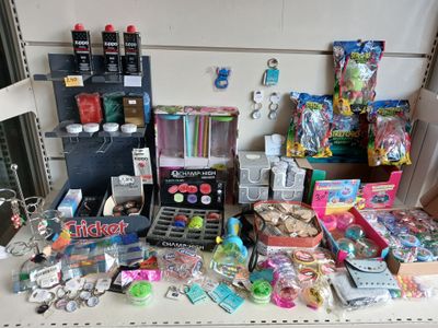 a table with many different items on it in the room