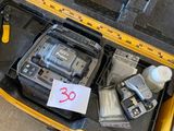 a yellow tool case with tools inside of it