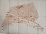 une vieille carte de la ville de Paris avec un bateau sur l'eau