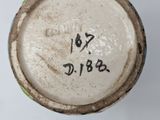 a close up view of a vase with numbers on it