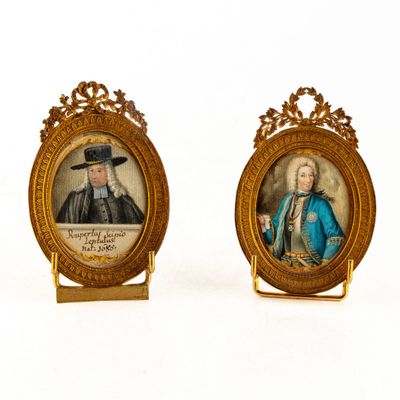 pair of miniature portraits of a gentleman and a woman in gold frames