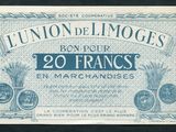 un gros plan d'un billet de banque français sur lequel figure un épi de blé