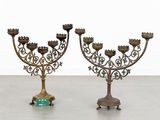 pair of antique brass candelabs with green glass vases