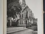 black and white photograph of an old church with a steeple