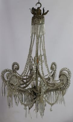 Lustre fontaine à 8 branches ornées de double et triple rang…