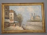 une photo d'un tableau accroché au mur