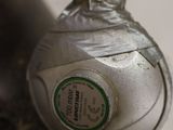 a close up of a gas bottle on a table