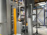 a large machine that is sitting inside of a building