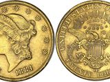a gold coin with a woman ' s head and eagle on it