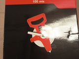 packaging of a red and black box with a red handle and a red handle