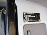 a close up of a cell phone on a shelf