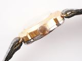 an image of a close up of a watch on a white surface