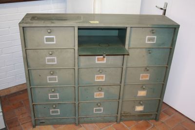 a cabinet with a bunch of drawers in it