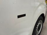 a white van with a sticker on the side of it