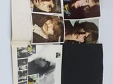 a lot of pictures of the beatles on the wall
