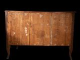 an old wooden cabinet with peeling paint on it